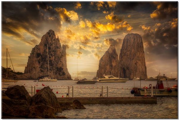 woda i łódki na obrazie