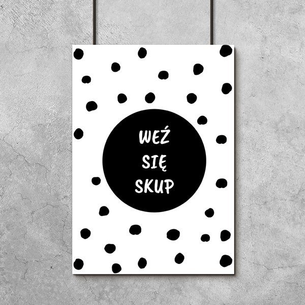 plakat z czarnymi kropkami