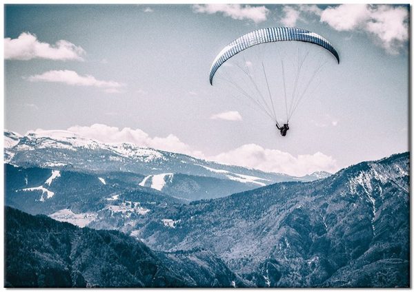 plakat z motywem spadochroniarza