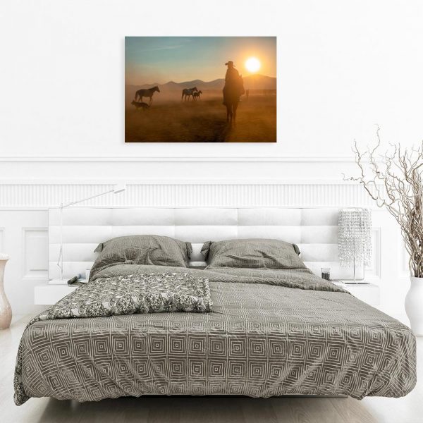 Obraz z kowbojem i końmi