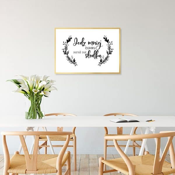 Plakat z ornamentem i napisem