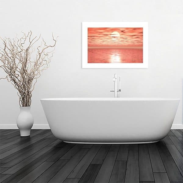 plakat z motywem zachodu słońca w łazience