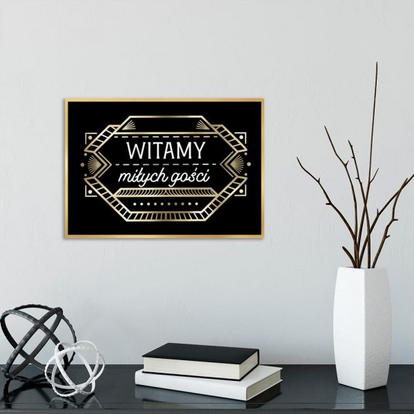 plakat z sentencją i złotym wzorem