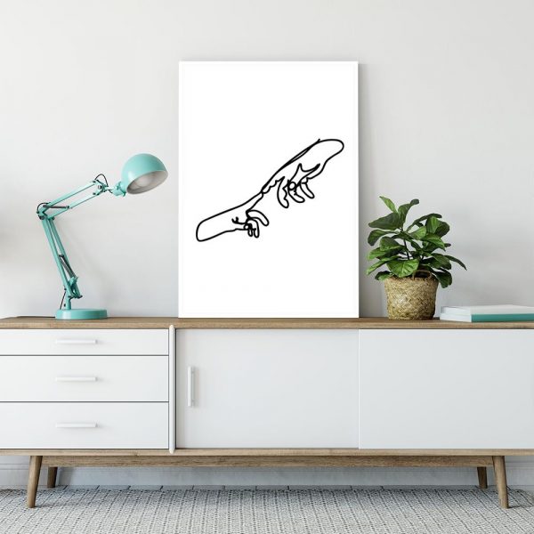 dwie dłonie na plakacie