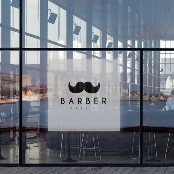 naklejka na witrynę z logo studia barberskiego