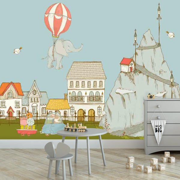 Fototapeta polecana do pokoju dziecka - Słonik lecący balonem