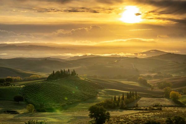 Obraz zachodzące słońce nad toskańskim Belwederem
