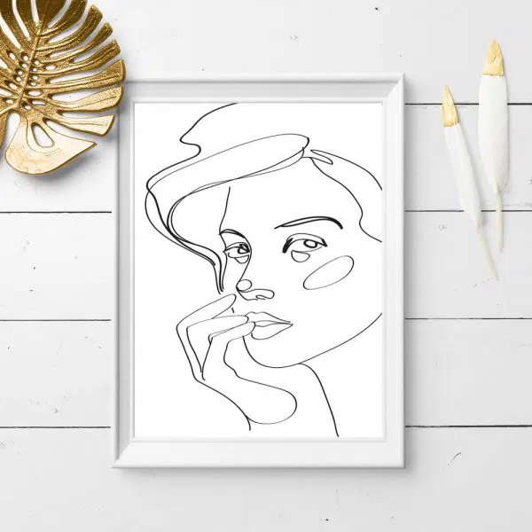 Plakat z czarno-białym rysunkiem twarzy