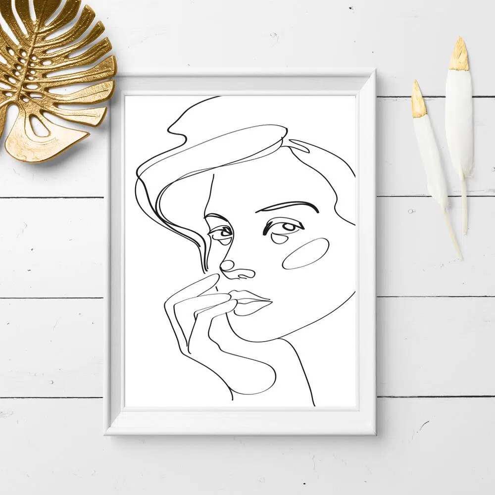 Plakat z czarno-białym rysunkiem twarzy