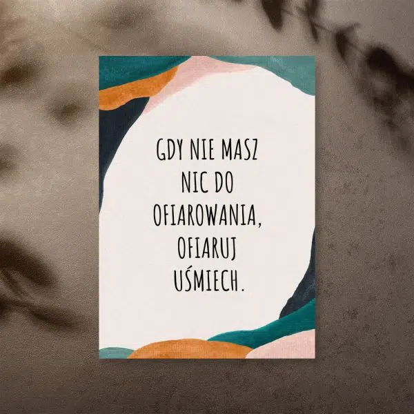Plakat z sentencją na tle abstrakcji