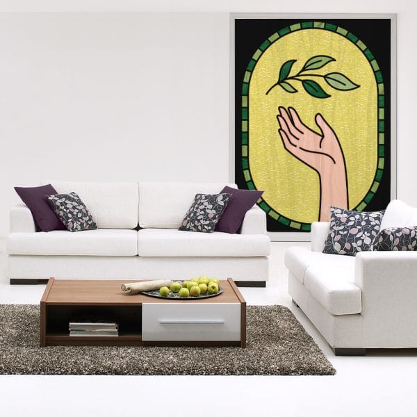 Gałązka i dłoń na naklejce na okno